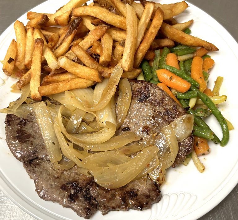 Fireside Welland restaurant baby beef liver with sauteed onions fresh cut fries and veggies