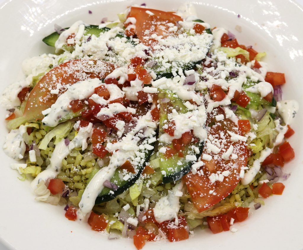 Fireside Welland restaurant veggie bowl with fresh vegetables and tzatziki feta cheese