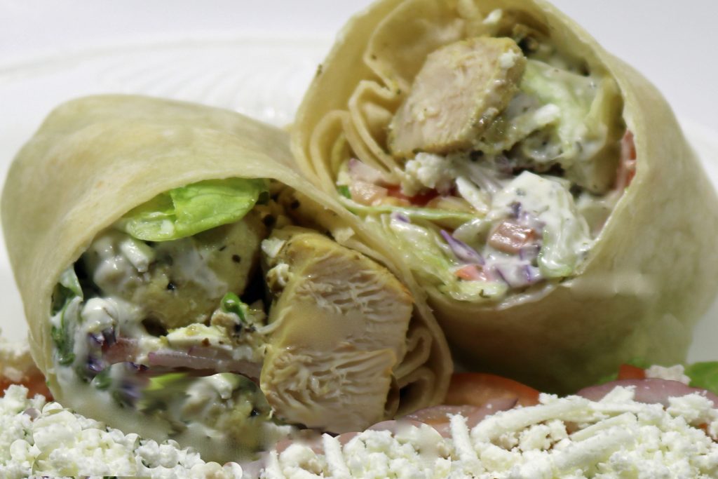 Fireside Welland restaurant chicken souvlaki in a wrap with Greek Salad