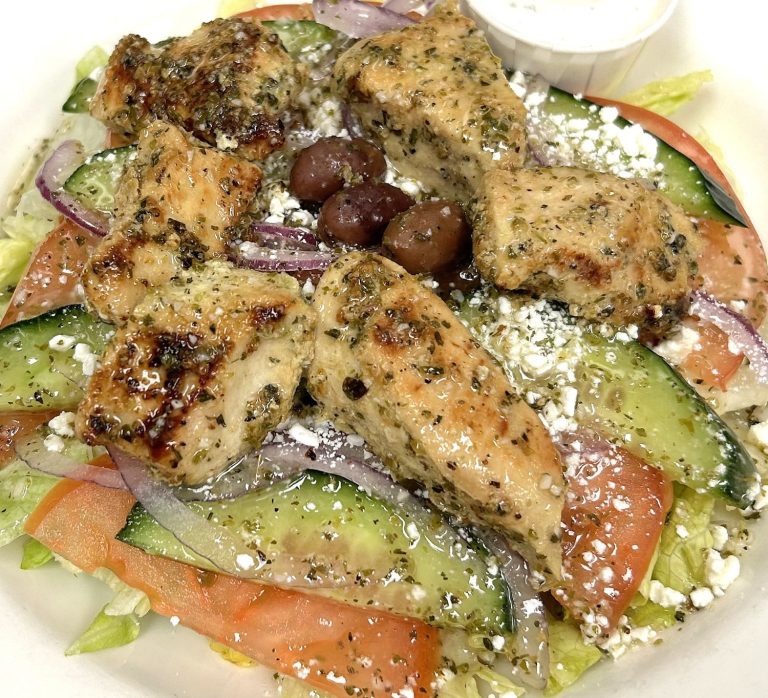 Fireside Restaurant Welland famous Greek salad with Souvlaki Chicken and our homemade salad dressing