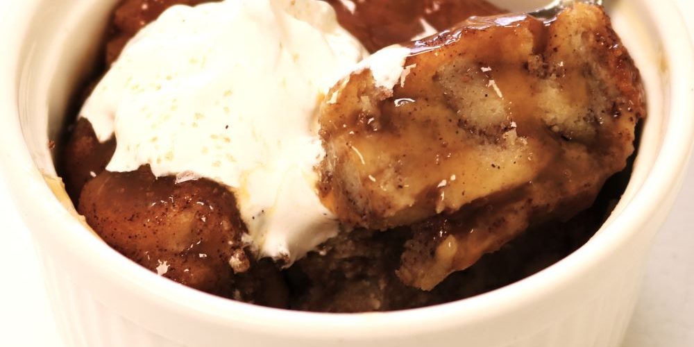 Fireside Welland restaurant homemade bread pudding with caramel sauce and whipped cream